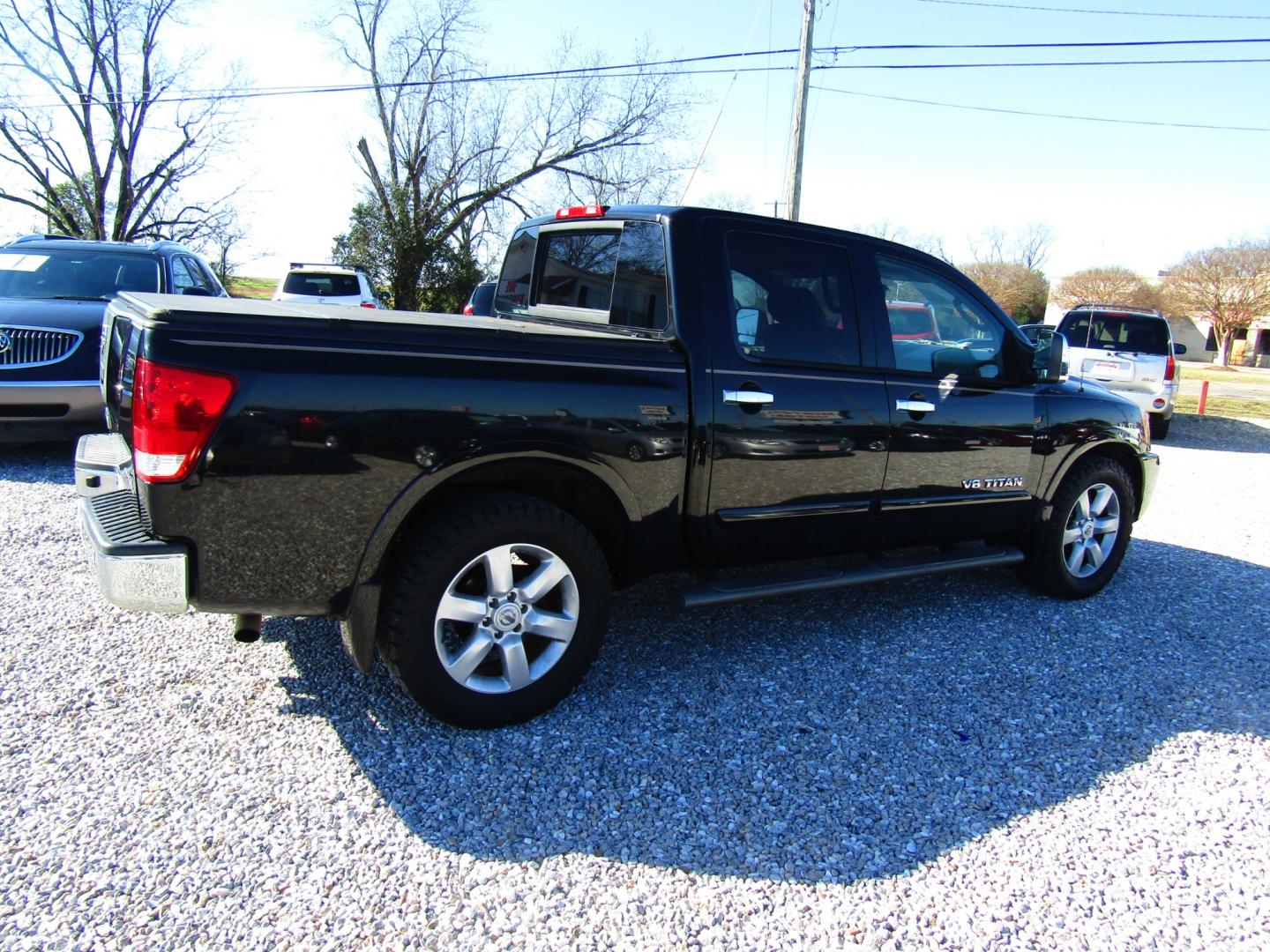 2011 Black /Tan Nissan Titan (1N6BA0ED1BN) , Automatic transmission, located at 15016 S Hwy 231, Midland City, AL, 36350, (334) 983-3001, 31.306210, -85.495277 - Photo#7